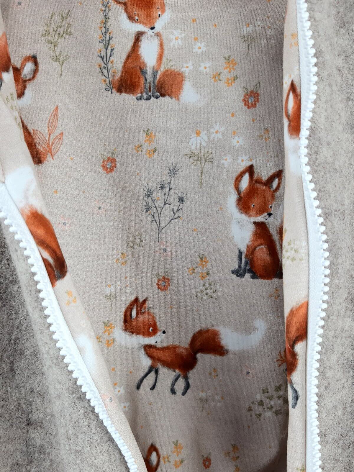 Walkoverall sand meliert mit Fuchsi creme