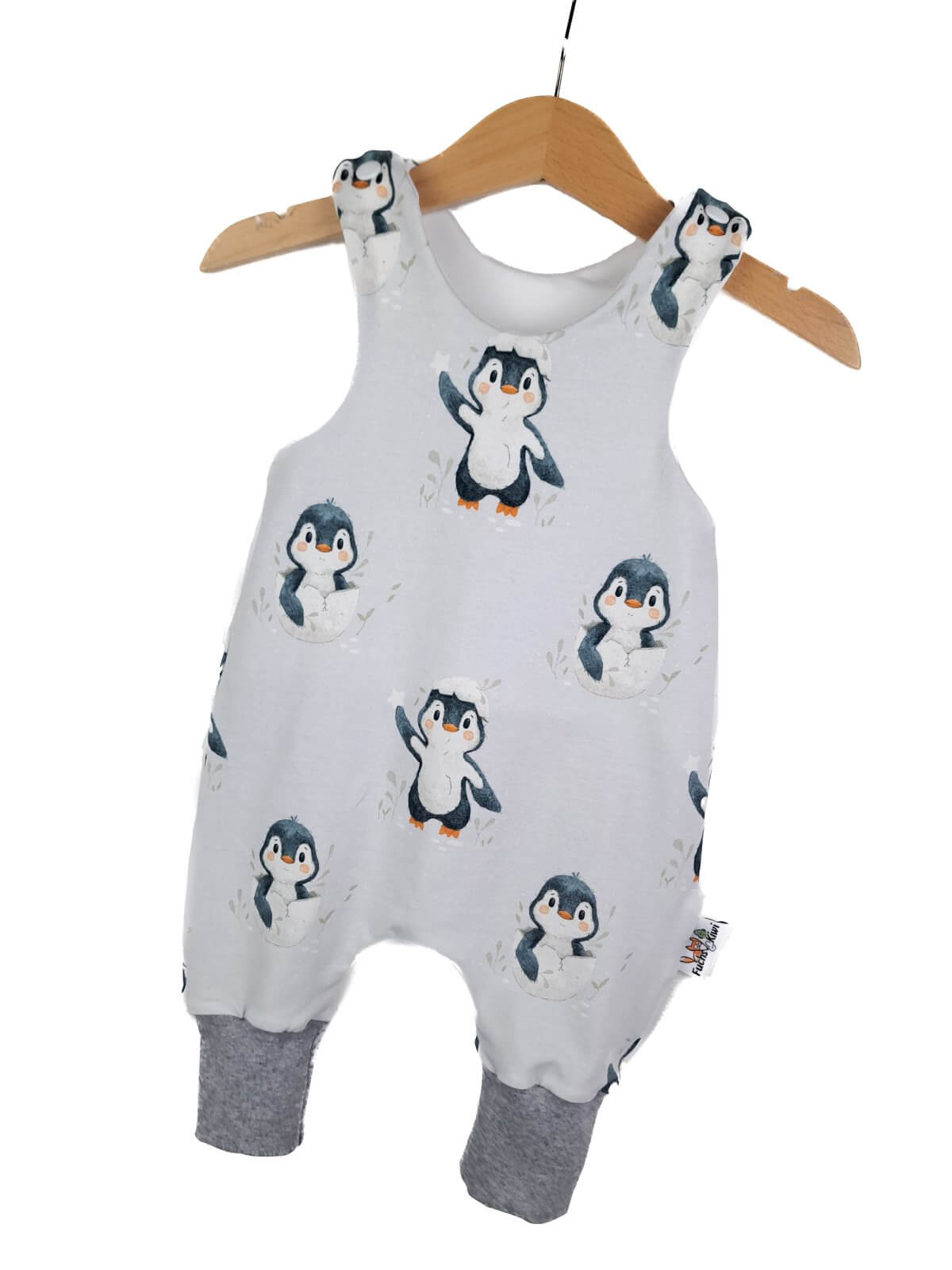 Strampler Pinguinbaby