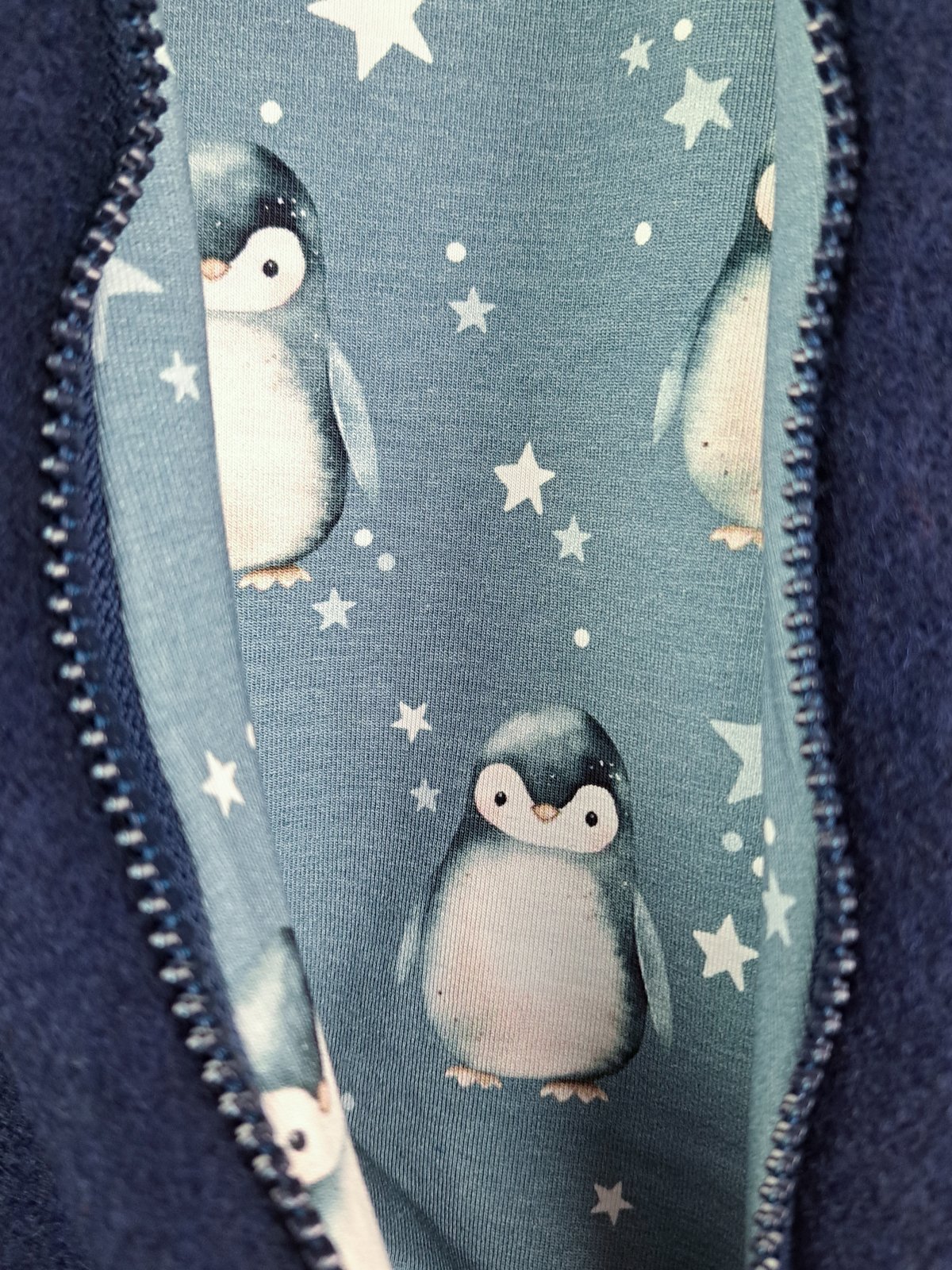 Walkoverall blau mit Pinguine blau