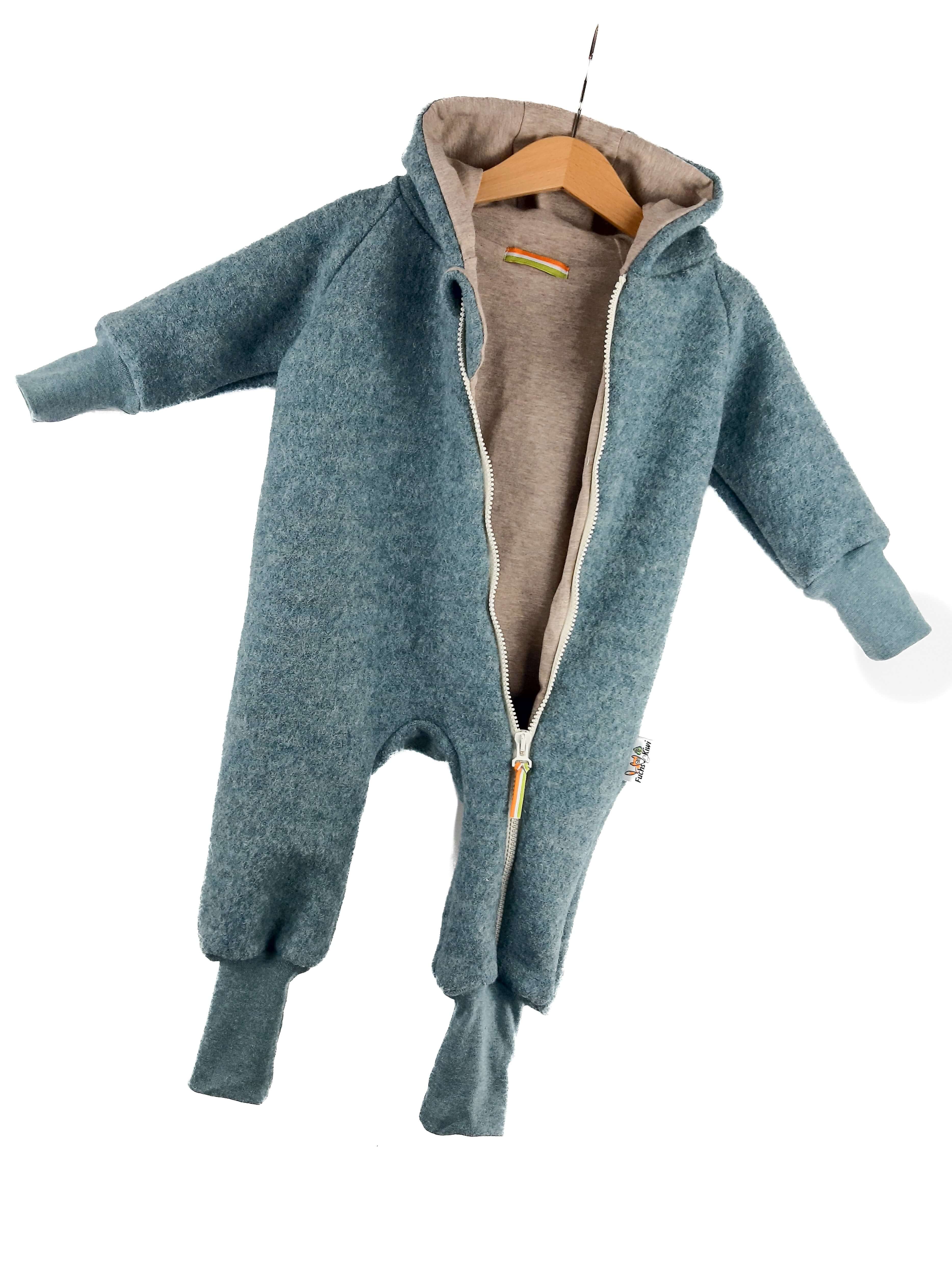 Walkoverall aus Merinowolle mint meliert mit sand meliert 80/86