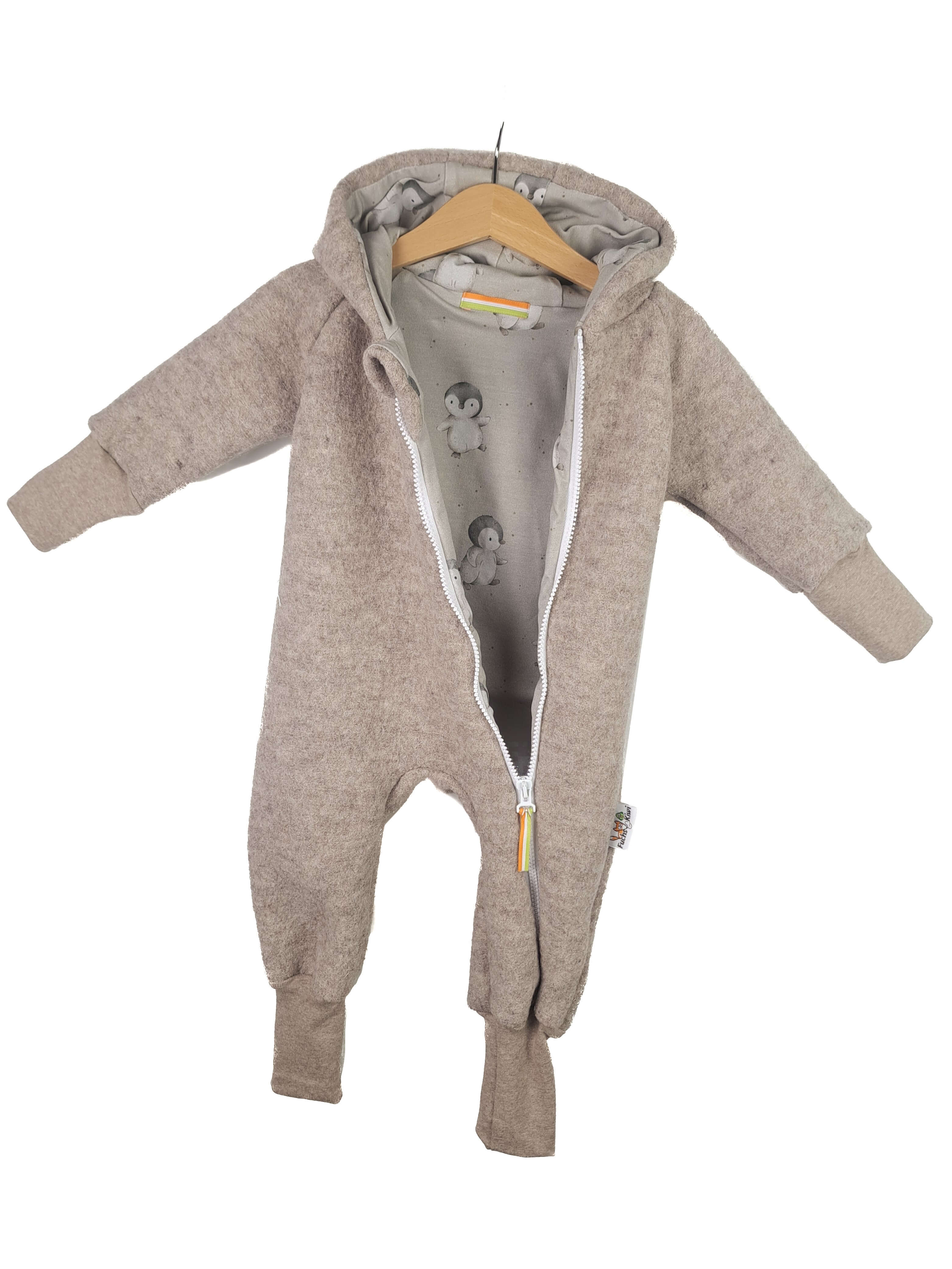 Walkoverall sand meliert mit Pinguine sand