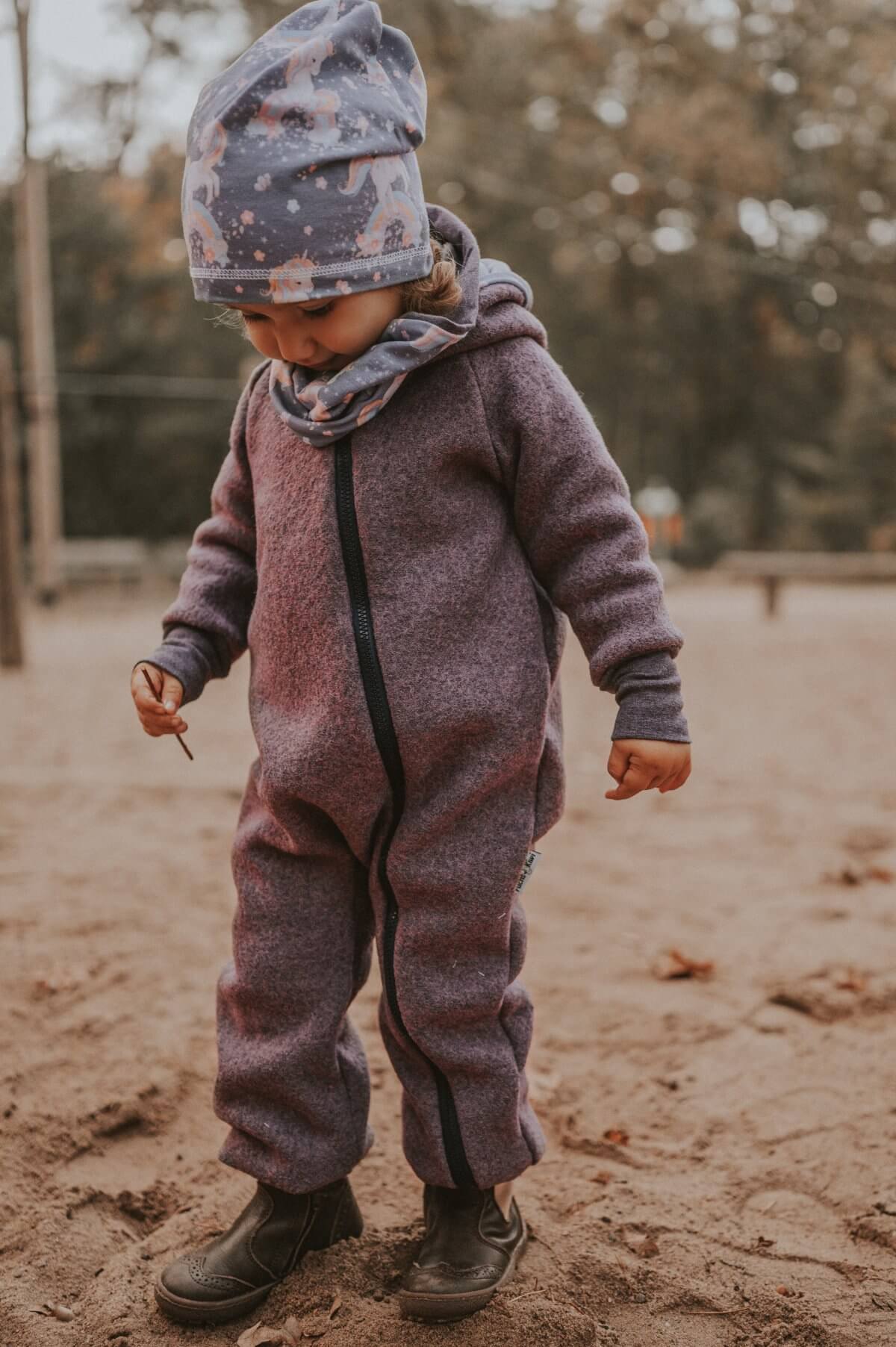 Walkoverall aus Merino Wollfleece flieder meliert mit Einhörner flieder